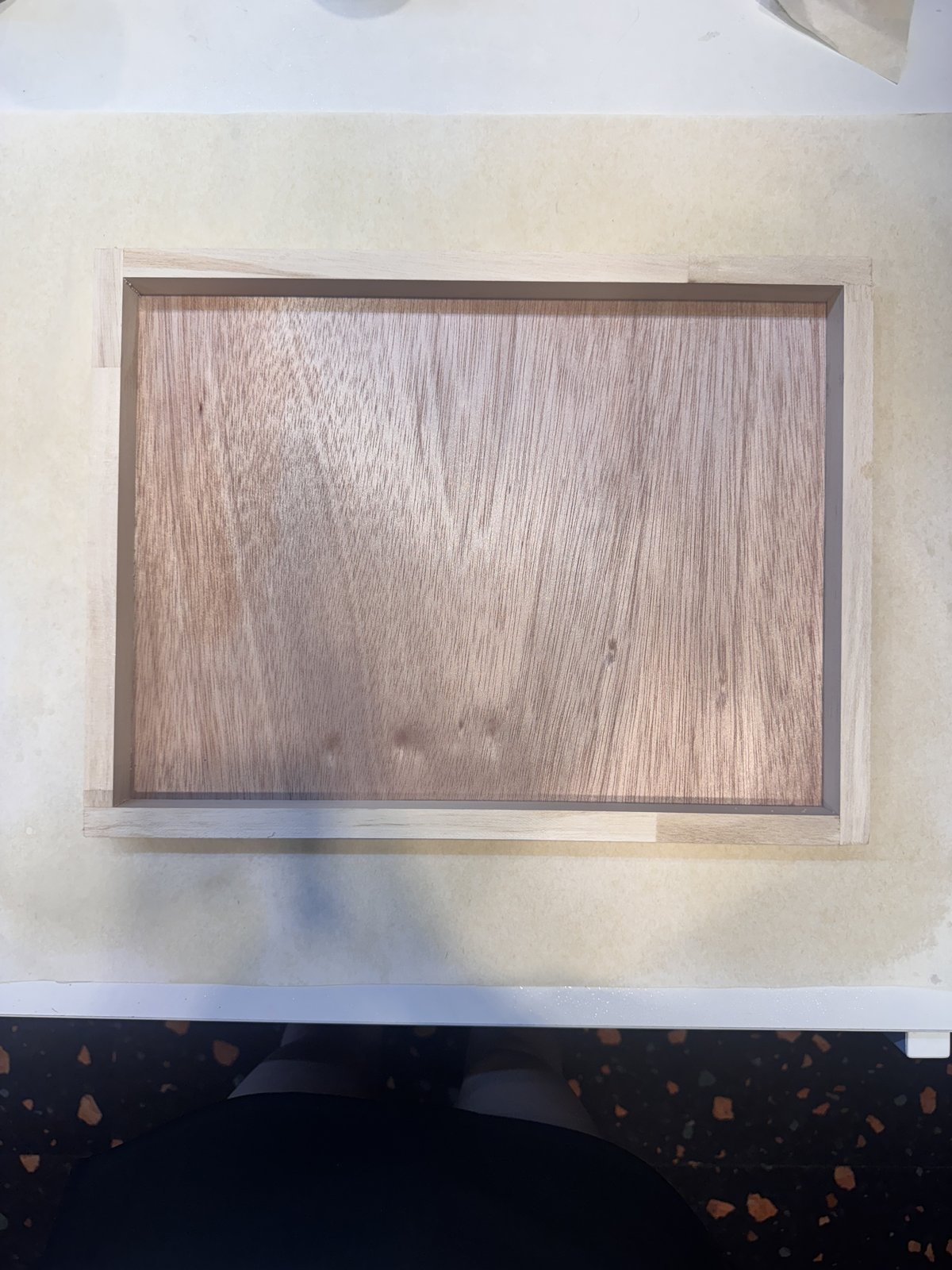 A wooden panel prepared for painting.